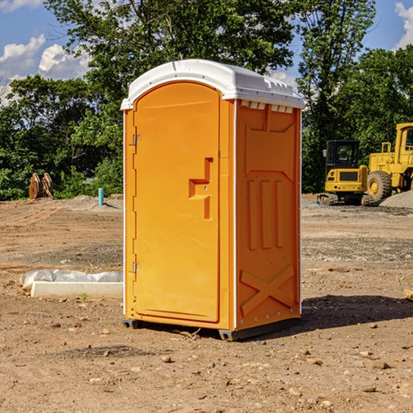 how often are the portable restrooms cleaned and serviced during a rental period in Adair IL